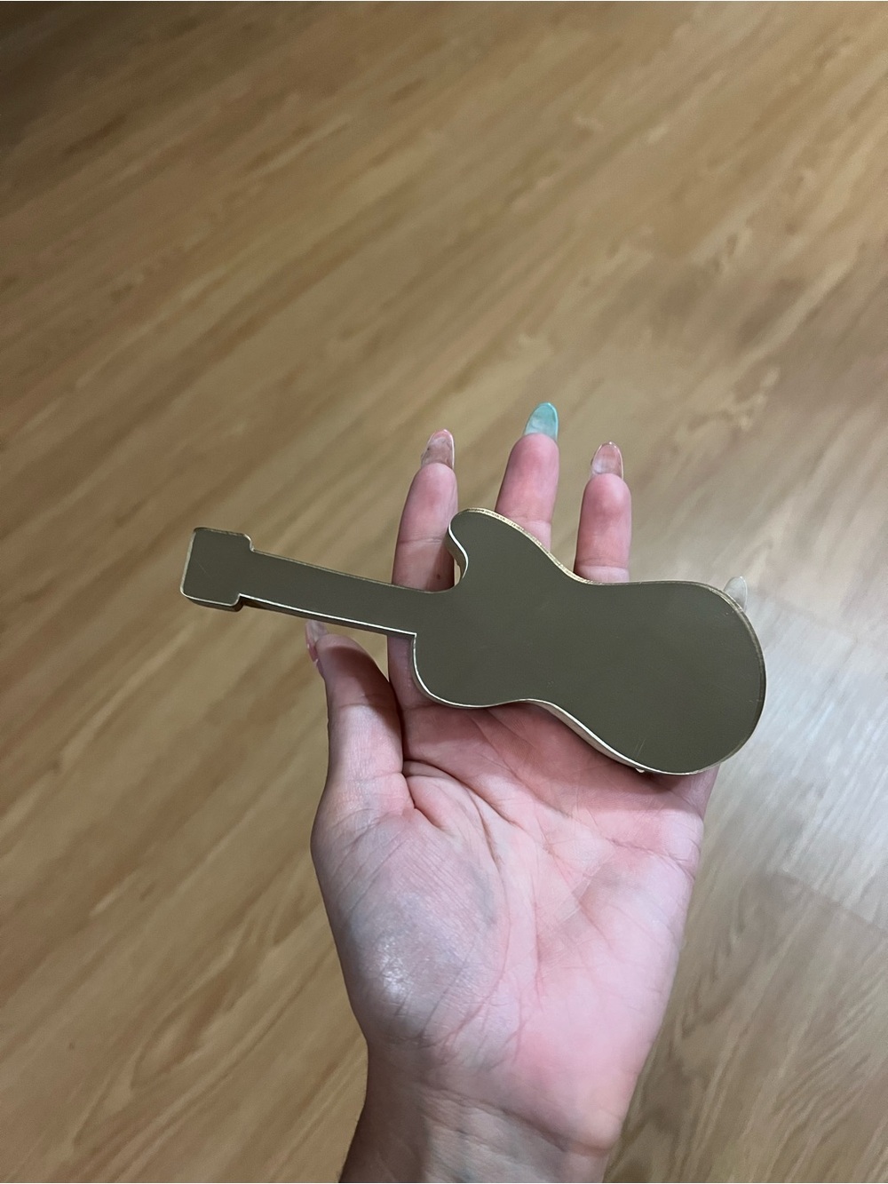 Mirror guitar with a cork back